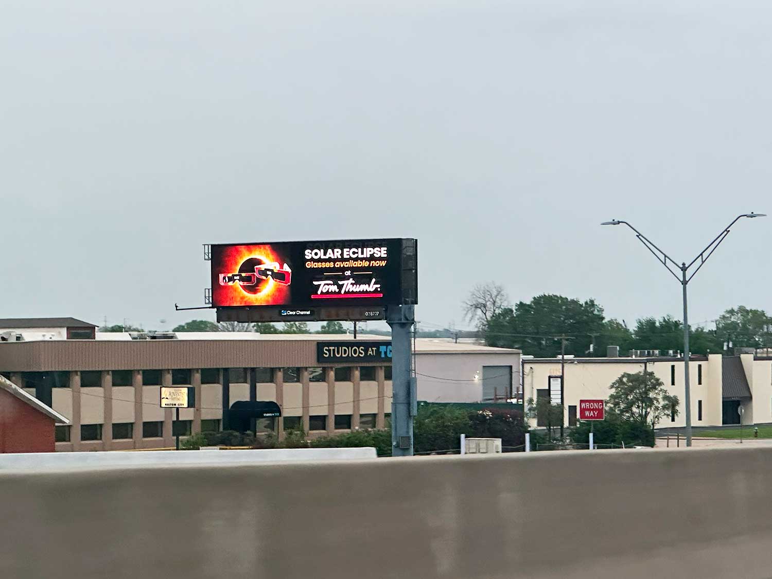 Haltom City Digital Billboard by CCO advertising Solar Eclipse Glasses Sold at Tom} Thumb March 31st 2024